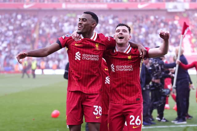 Liverpool's Ryan Gravenberch (left) and Andy Robertson celebrate victory and the Premier League title following the 5-1 win over Tottenham at Anfield.
