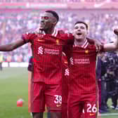 Liverpool's Ryan Gravenberch (left) and Andy Robertson celebrate victory and the Premier League title following the 5-1 win over Tottenham at Anfield.