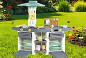 The Dolu play kitchen is durable enough to be used in the garden 