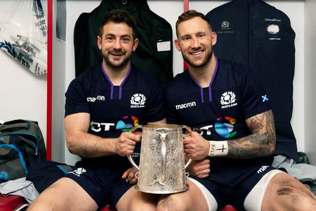 Byron McGuigan, right, with captain Greig Laidlaw after Scotland had retained the Calcutta Cup at Twickenham in 2019.