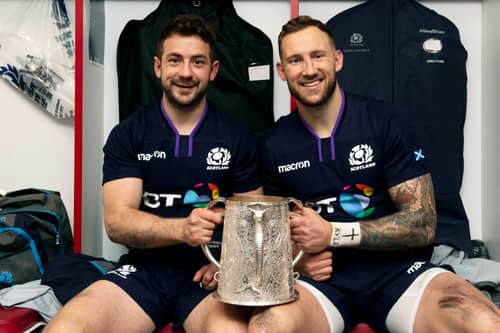 Byron McGuigan, right, with captain Greig Laidlaw after Scotland had retained the Calcutta Cup at Twickenham in 2019.