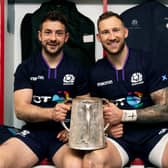 Byron McGuigan, right, with captain Greig Laidlaw after Scotland had retained the Calcutta Cup at Twickenham in 2019.