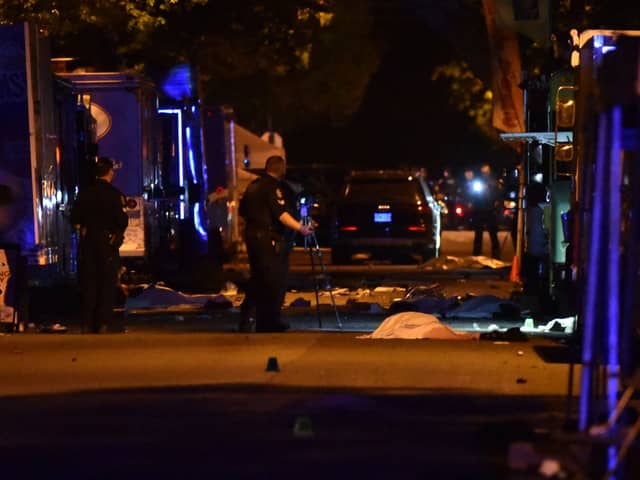 Vancouver police investigate a crime scene after a man drove into pedestrians at the annual Lapu Lapu festival celebrating Filipino culture in the south of Vancouver. Picture: Don Mackinnon/AFP via Getty Images