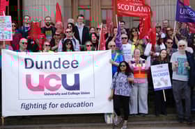 Trade unionists, community activists, students and staff from the University of Dundee take part in a rally and march on Tuesday