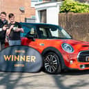 Andrew Heal woke up to see a familiar face at the door - and then he was given a massive prize