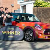 Andrew Heal woke up to see a familiar face at the door - and then he was given a massive prize