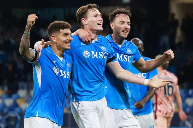 Scott McTominay, centre, celebrates with Napoli teammates after scoring against Torino on Sunday (Picture: Francesco Pecoraro)