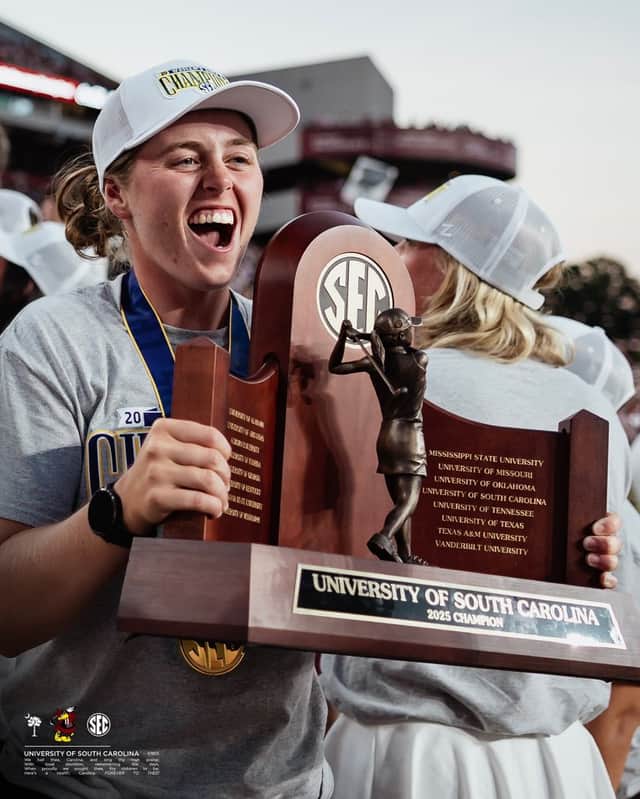 Hannah Darling shows off the SEC Championship trophy