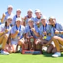 Hannah Darling, front centre, celebrates with her University of Carolina team-mates after winning the SEC Championship in Florida
