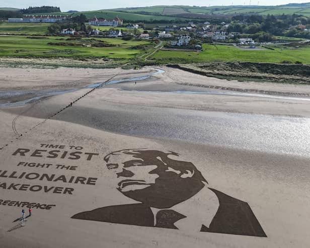 Greenpeace's artwork on the beach outside Trump Turnberry, showing a giant portrait of the US president etched into the sand with the message: "Time to resist - fight the billionaire takeover"