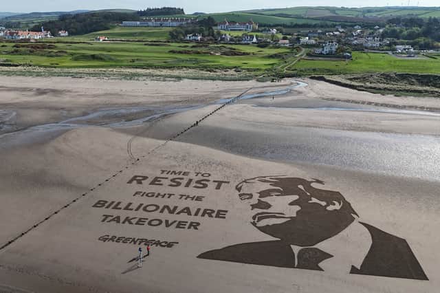 Greenpeace's artwork on the beach outside Trump Turnberry, showing a giant portrait of the US president etched into the sand with the message: "Time to resist - fight the billionaire takeover"