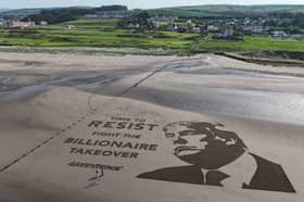 Greenpeace's artwork on the beach outside Trump Turnberry, showing a giant portrait of the US president etched into the sand with the message: "Time to resist - fight the billionaire takeover"