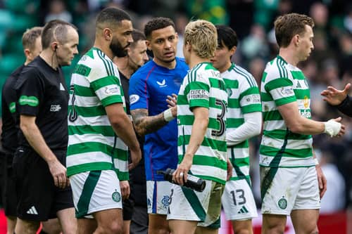 Rangers' James Tavernier (centre) and Celtic's Daizen Maeda shake hands after the most recent Old Firm match.  (Photo by Craig Foy / SNS Group)