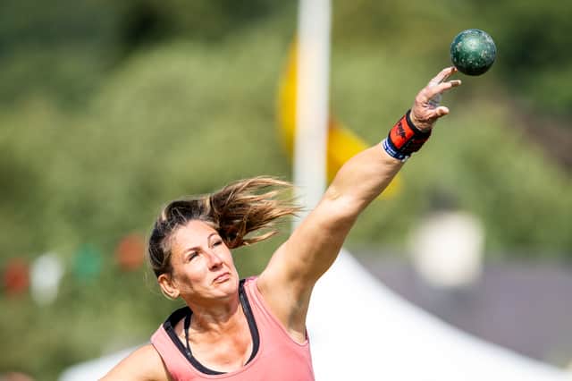 An athlete participates in the shot put at the Glenurquhart Highlands Games in 2024
