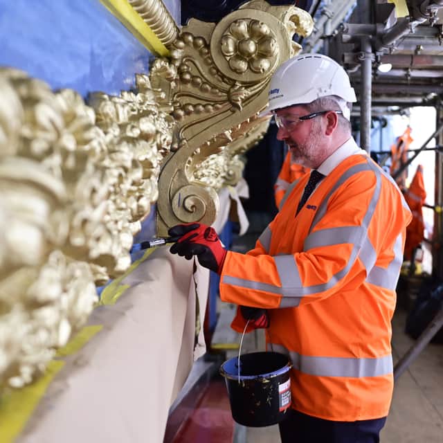 City council transport convener Stephen Jenkinson helping with the painting work on North Bridge on Wednesday