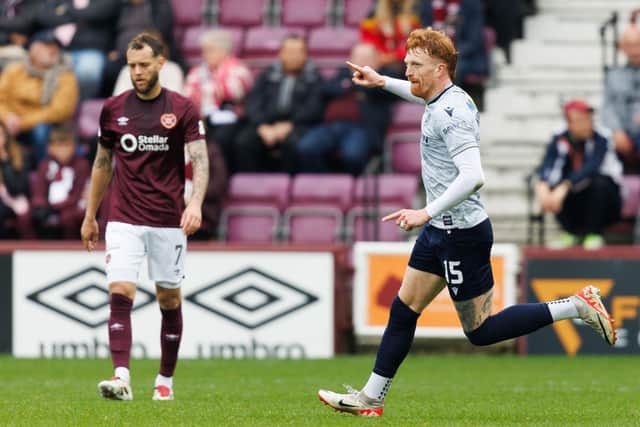 Dundee's Simon Murray celebrates scoring to make it 1-0 over Hearts at Tynecastle last weekend. (Photo by Ross Parker / SNS Group)