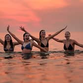 Hundreds of brave souls took part in the traditional May Day dip in St Andrews.