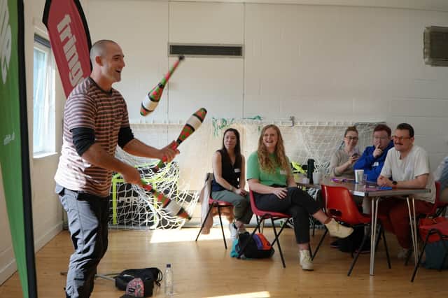 Juggler Kevin Armour performs at the launch of this year's Fringe Day Out initiative.