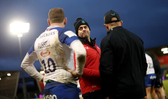 Johann van Graan, centre, Bath Rugby's head coach, with Finn Russell, left.