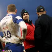 Johann van Graan, centre, Bath Rugby's head coach, with Finn Russell, left.