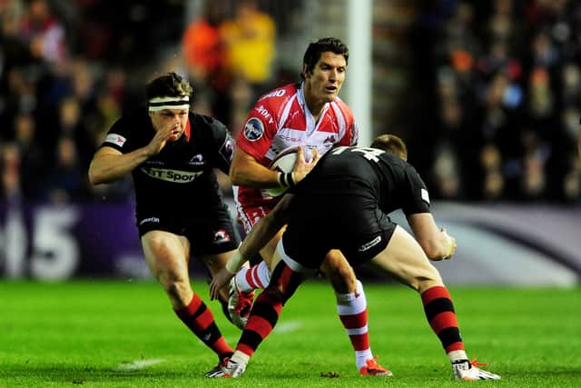 Hamish Watson, left, and Dougie Fife, right, try to stop James Hook of Gloucester during the 2015 European Challenge Cup final at Twickenham Stoop. Gloucester beat Edinburgh 19-13.