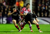 Hamish Watson, left, and Dougie Fife, right, try to stop James Hook of Gloucester during the 2015 European Challenge Cup final at Twickenham Stoop. Gloucester beat Edinburgh 19-13.