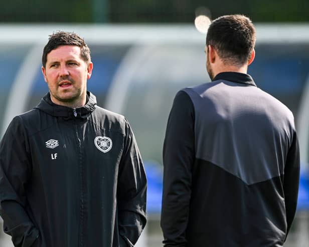 Hearts interim head coach Liam Fox and coach Lee Wallace during a training session at the Oriam, on May 01, 2025. (Photo by Paul Devlin / SNS Group)