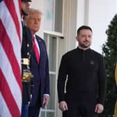 US President Donald Trump greets Ukrainian president Volodymyr Zelensky as he arrives at the White House in February, ahead of their explosive meeting involved JD Vance. Picture: Andrew Harnik/Getty Images