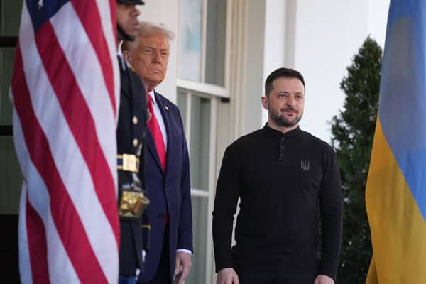 US President Donald Trump greets Ukrainian president Volodymyr Zelensky as he arrives at the White House in February, ahead of their explosive meeting involved JD Vance. Picture: Andrew Harnik/Getty Images