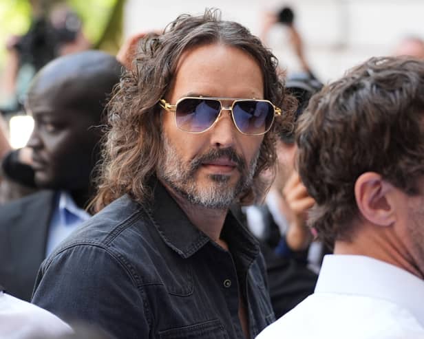 Russell Brand arriving at Westminster Magistrates' Court, London, where he is charged with with one count each of rape, indecent assault and oral rape, as well as two counts of sexual assault, relating to four separate women