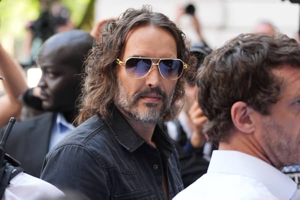 Russell Brand arriving at Westminster Magistrates' Court, London, where he is charged with with one count each of rape, indecent assault and oral rape, as well as two counts of sexual assault, relating to four separate women