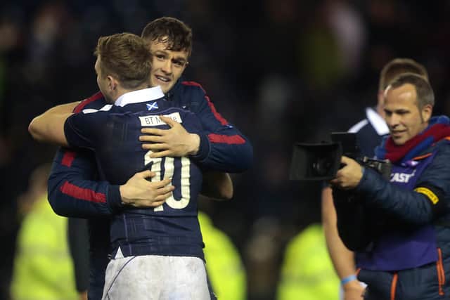 Magnus Bradbury and Finn Russell embrace after Scotland's  win over Argentina at Murrayfield in 2016.
