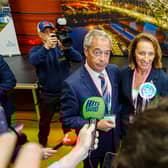 Reform UK's candidate Sarah Pochin (right) and party leader Nigel Farage speak to the media as they arrive ahead of the result of the Runcorn and Helsby by-election. Picture: Peter Byrne/PA Wire