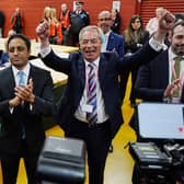 Reform UK leader Nigel Farage (right) and chair Zia Yusuf (centre) celebrate for the media after Reform candidate Sarah Pochin won the Runcorn and Helsby by-election in Widnes, Cheshire. Picture: Peter Byrne/PA Wire