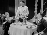 Getting a good table at a top restaurant has been an age-old struggle (Picture: Tunbridge/Tunbridge-Sedgwick Pictorial Press)