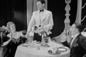 Getting a good table at a top restaurant has been an age-old struggle (Picture: Tunbridge/Tunbridge-Sedgwick Pictorial Press)