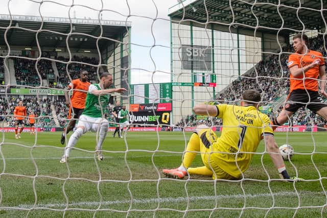 Hibs' Martin Boyle scores to make it 1-0 after an error from Dundee United's Declan Gallagher. (Photo by Alan Harvey / SNS Group)
