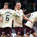 Hearts' Lawrence Shankland celebrates after scoring to make it 1-1 against Ross County in Dingwall. (Photo by Rob Casey / SNS Group)