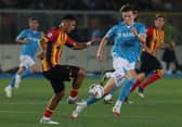 Scott McTominay (R) fights for the ball with Lecce's Danilo Veiga during Saturday's Serie A match . (Photo by CARLO HERMANN/AFP via Getty Images)          