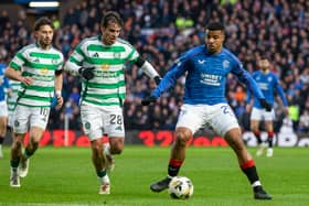 Celtic's Paulo Bernardo and Rangers' Hamza Igamane in action during the Old Firm match at Ibrox on January 2, 2025.  (Photo by Craig Williamson / SNS Group)