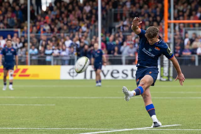 Edinburgh's Ross Thompson kicks a conversion during the Bath match.