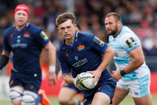 Ross Thompson carries the ball forward during Edinburgh's defeat by Bath.