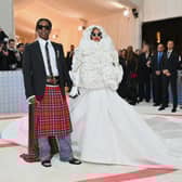 Rihanna and her partner ASAP Rocky arrive for the 2023 Met Gala.