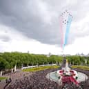 The Red Arrows thunder over Buckingham Palace