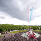 The Red Arrows thunder over Buckingham Palace