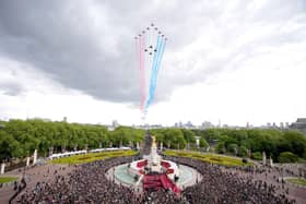 The Red Arrows thunder over Buckingham Palace