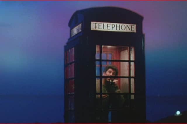 Actor Peter Riegert, who played 'Mac' MacIntyre, inside the famous phone box in the film Local Hero