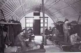 Inside a Nissen hut at Cultybraggan POW camp, which housed around 4,000 men during World War Two. Among them were Nazi hardliners, with Cultybraggan one of only two 'black list' camps. This picture was taken in 1953 and shows US soldiers stationed there on training exercises.