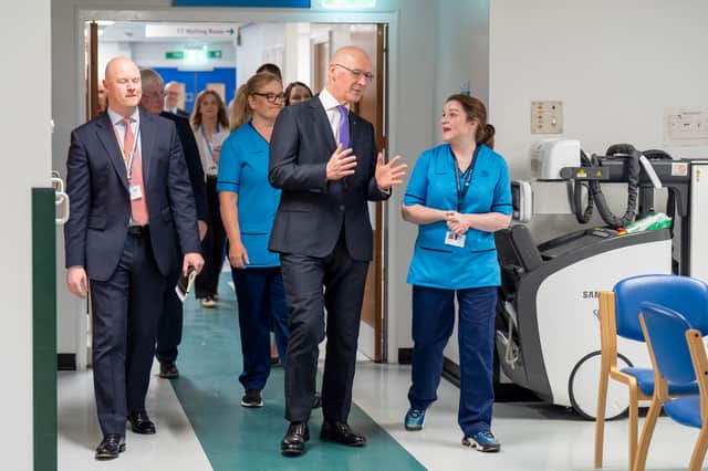 John Swinney, seen on a visit to St John's Hospital in Livingston last year, knows the state of the NHS will be a key election issue (Picture: Jane Barlow/pool)