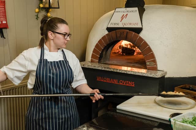Giovanni's boasts a classic wood-burning pizza oven